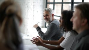 Illustration of effective leadership communication and collaboration within a leadership team.